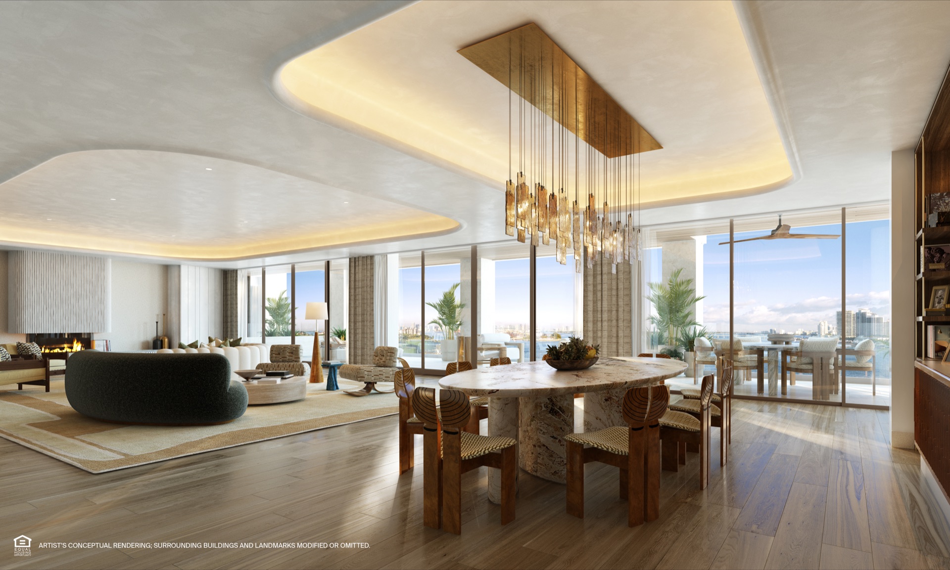 Great room at Six Fisher Island — The Residences. Tara Bernerd & Partners interior architecture, ten-foot ceilings, floor-to-ceiling windows opening onto the 15-foot-deep terrace, panoramic Biscayne Bay views.